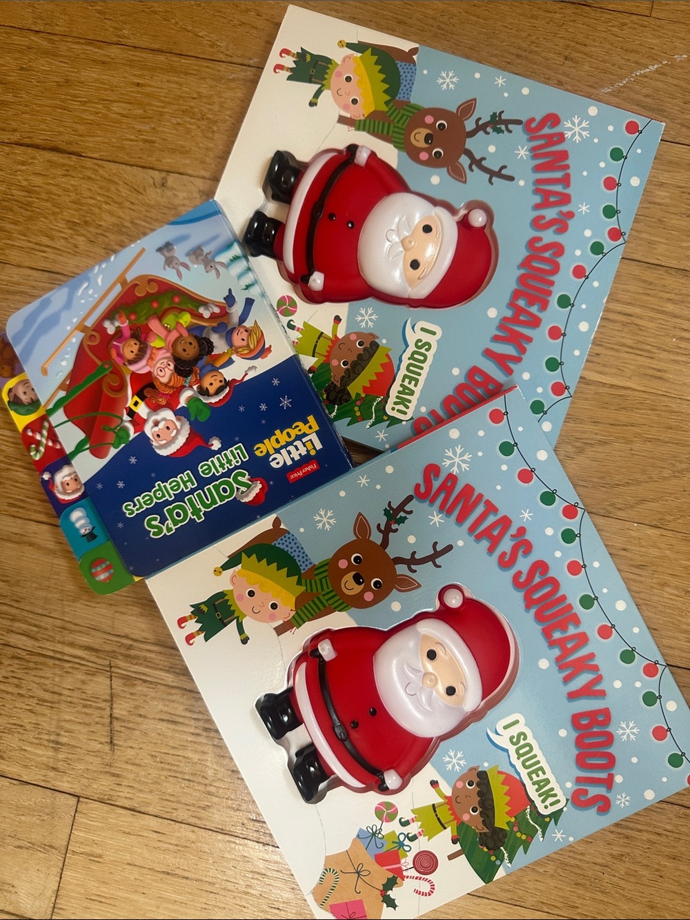 2 “Santa's Squeaky Boots” and 1 “Santa’s little helpers” books.. 3 for $10